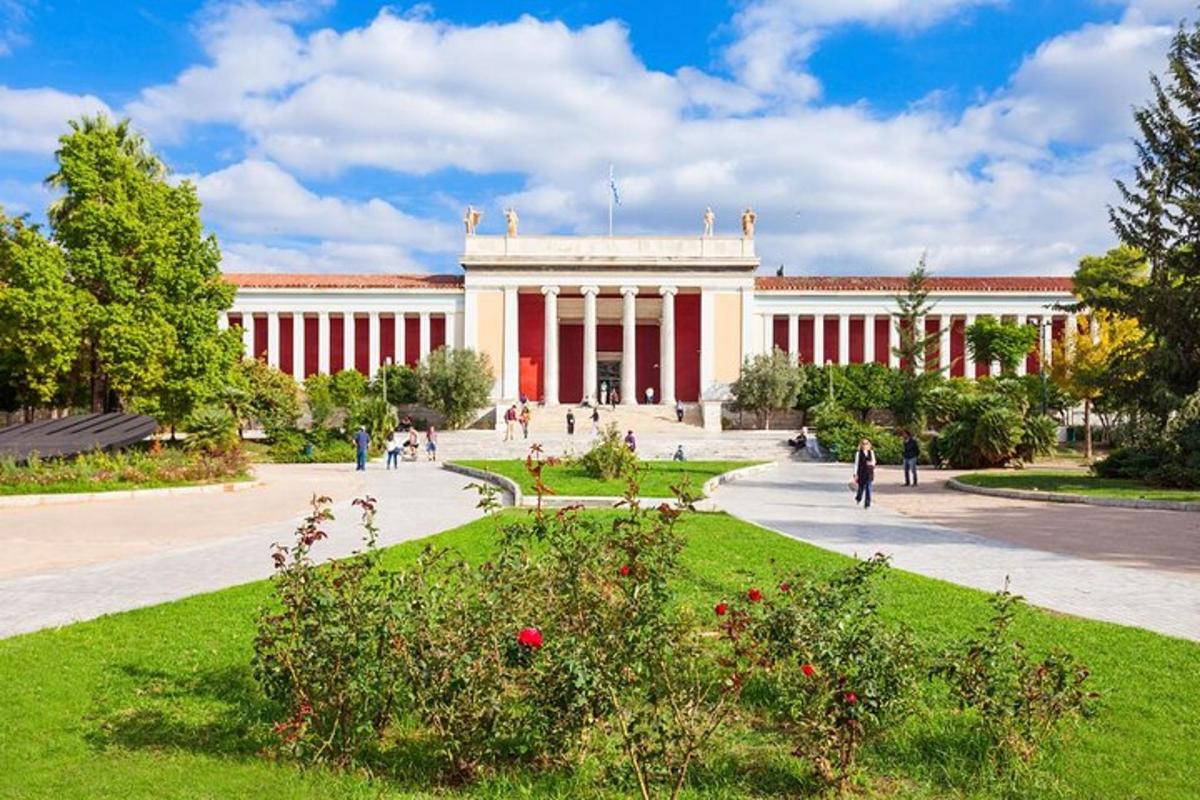 a large building with people walking in front of it