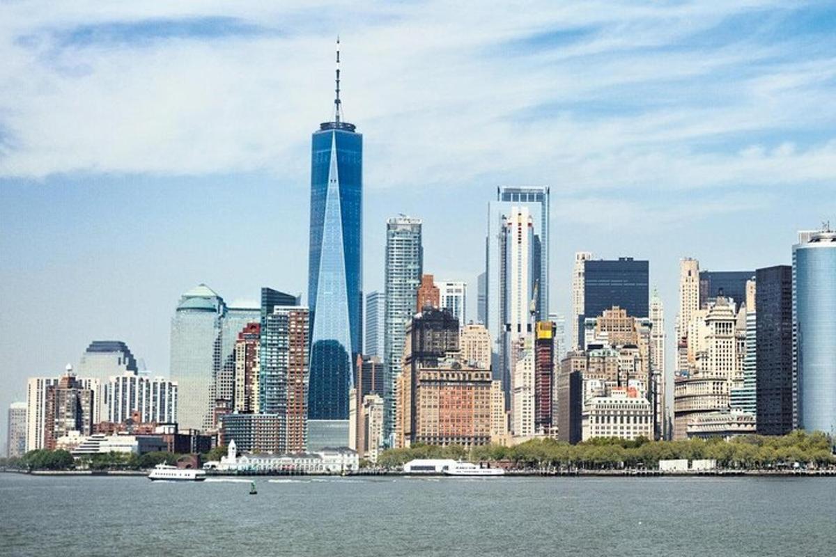a view of a large city with a tall skyscraper