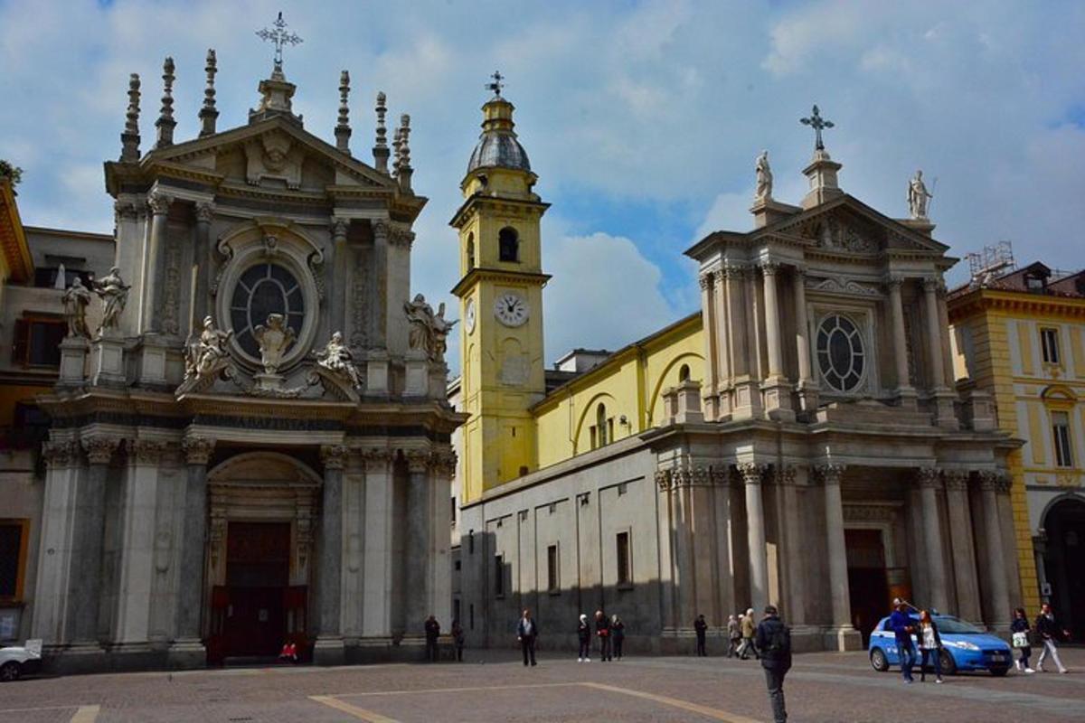 a building with a clock tower and a church