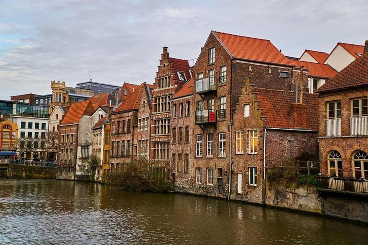 a group of buildings next to a river