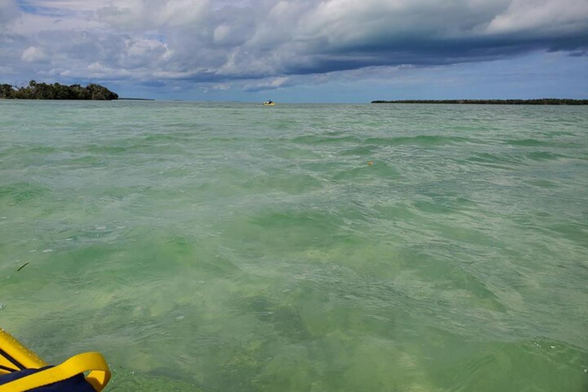 a view of the ocean from a boat in the water