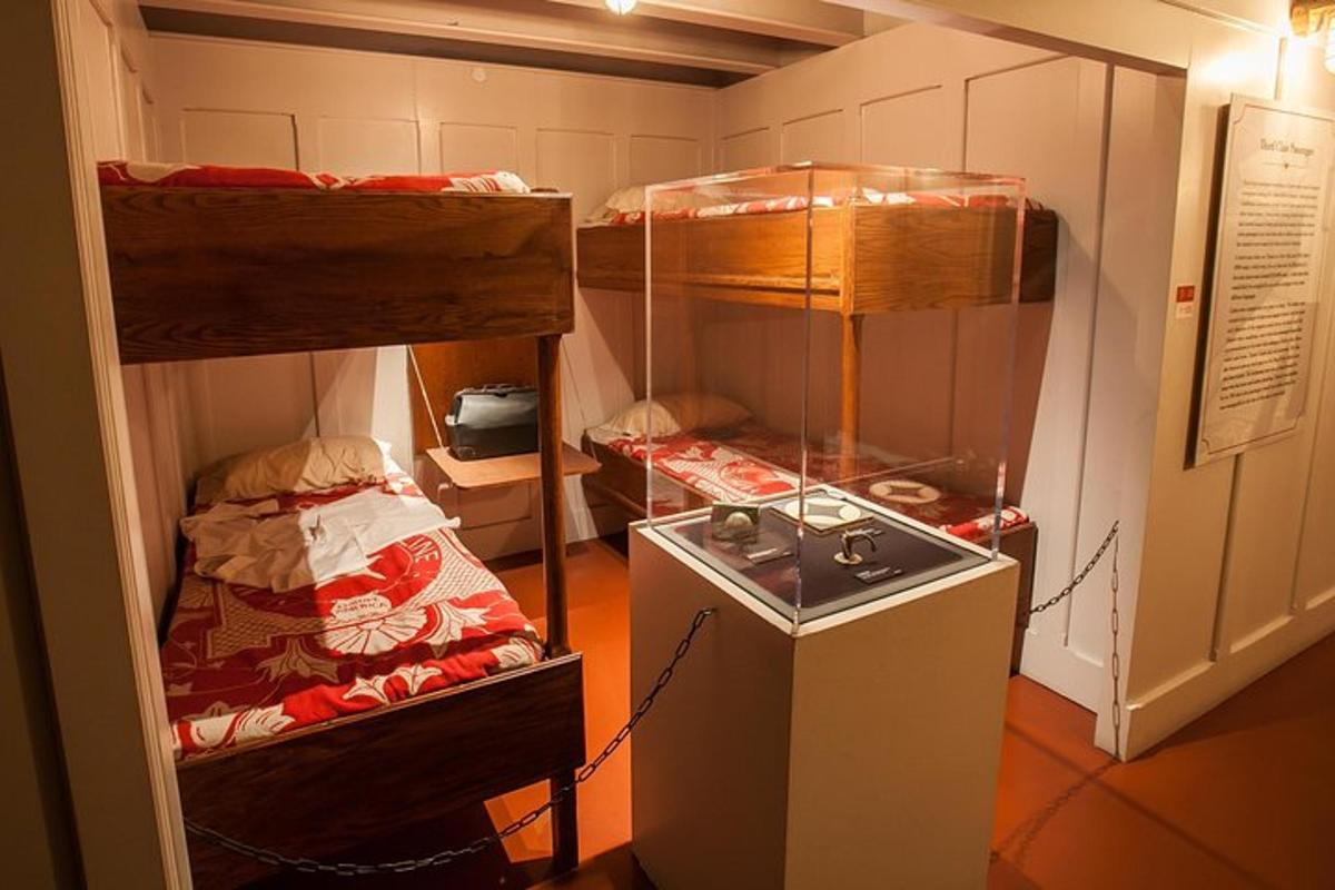 a small room with two bunk beds in it