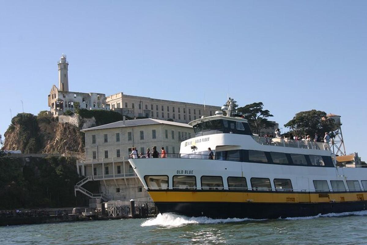 a large boat in the water near a building