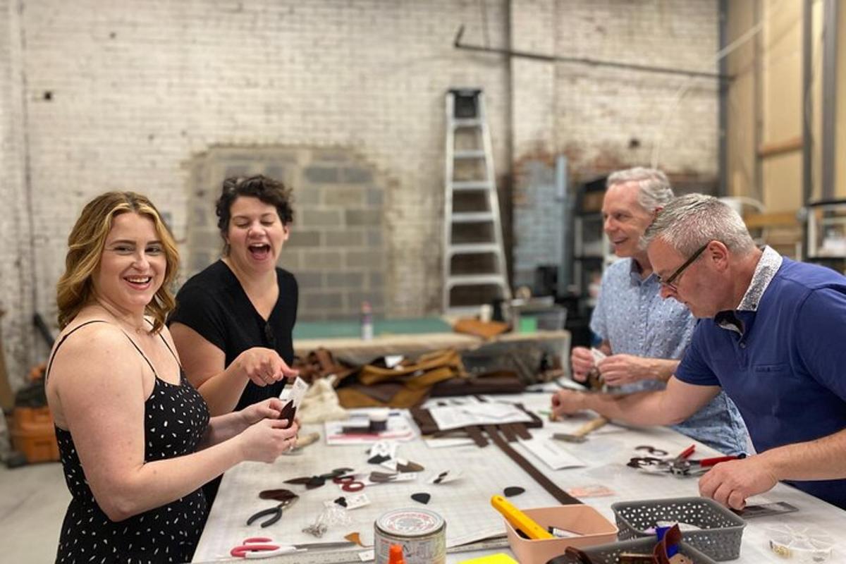 a group of people standing around a table with tools