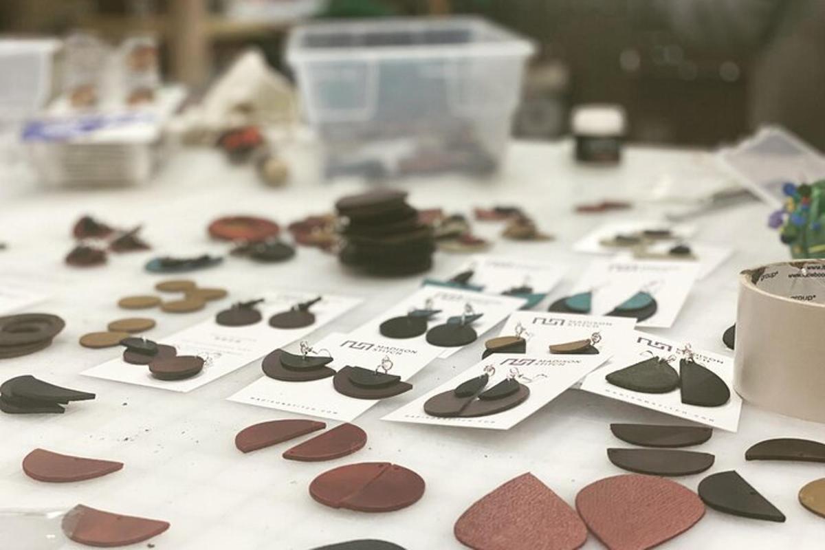 a table topped with lots of different types of shoes