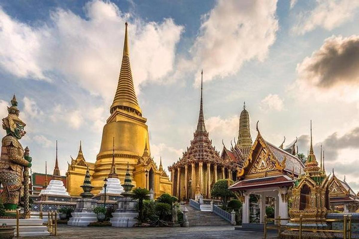 a group of buildings with spires on top