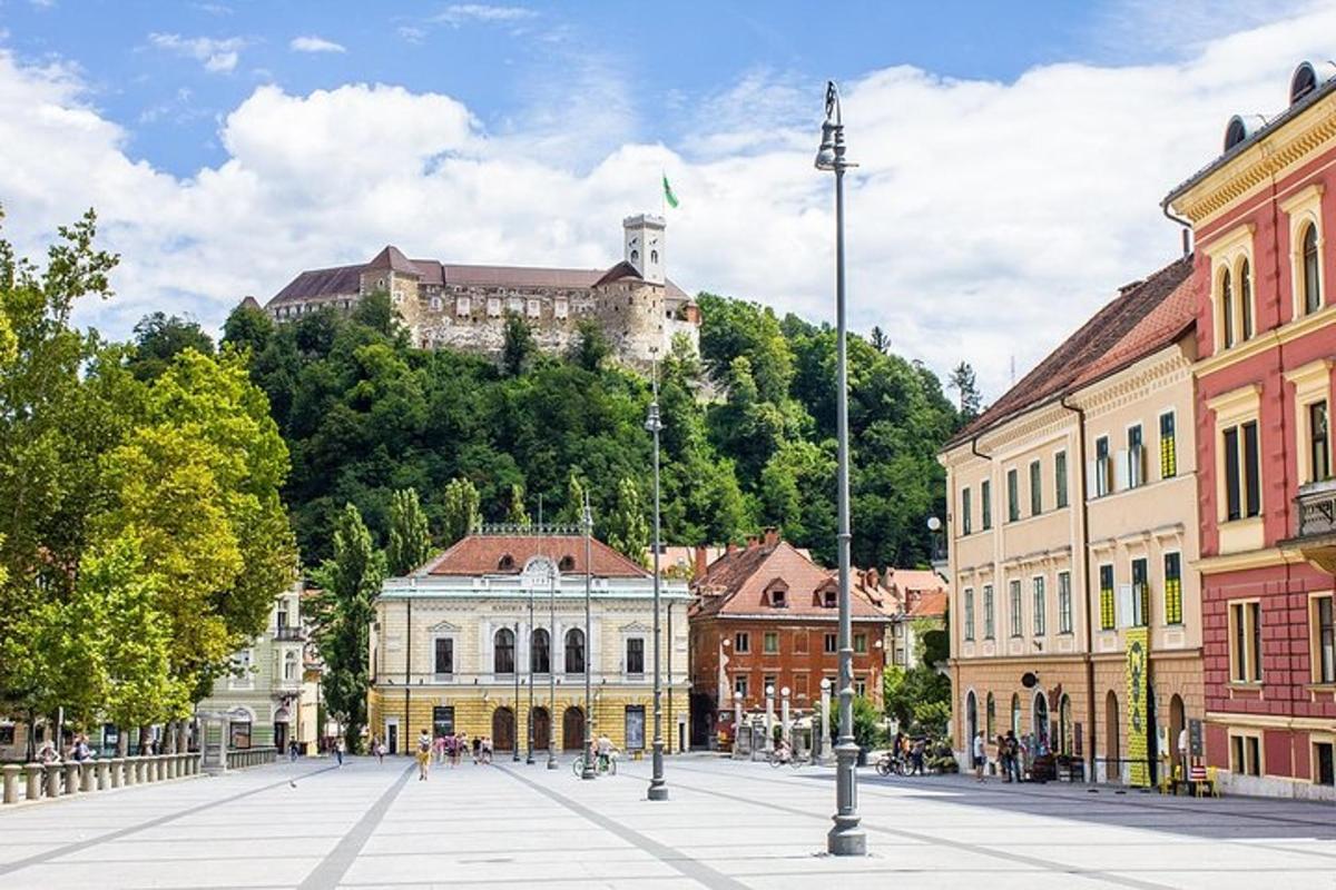 a city with a castle on top of a mountain