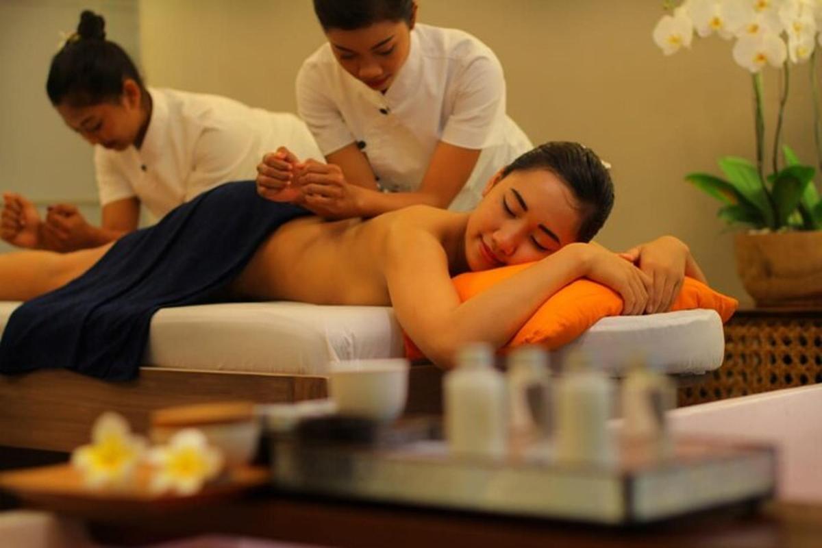 a woman getting a massage from a massage therapist