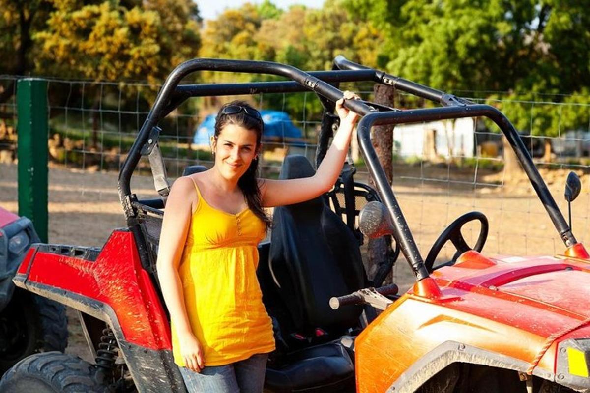 a woman is standing in the open door of a vehicle