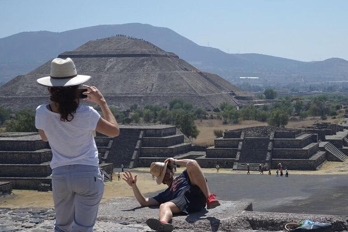 two women standing at the pyramid ofaraohs at theramids