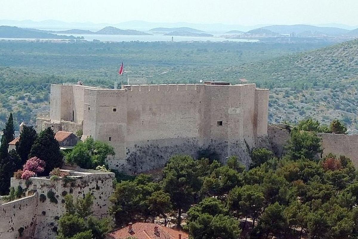a large building with a flag on top of it