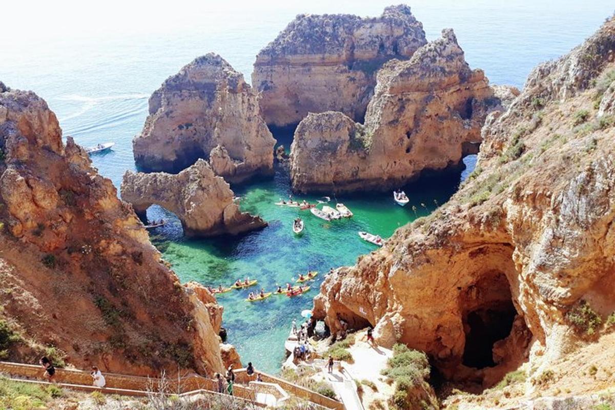 a view of a beach with people in the water