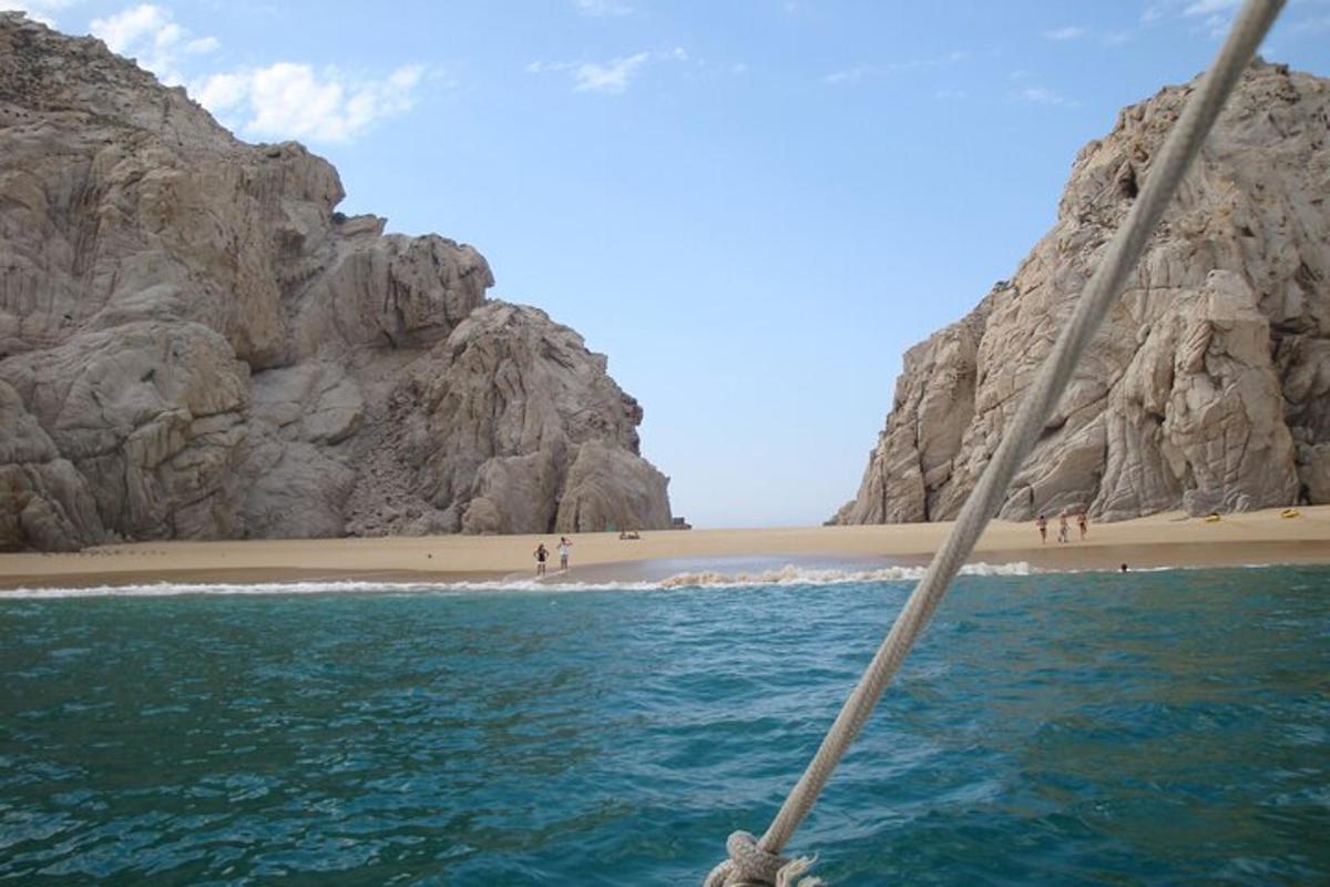 a view of a beach from a boat in the water