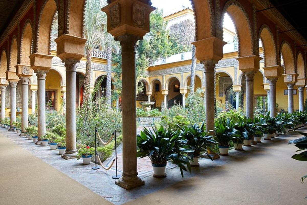 a row of potted plants in a building