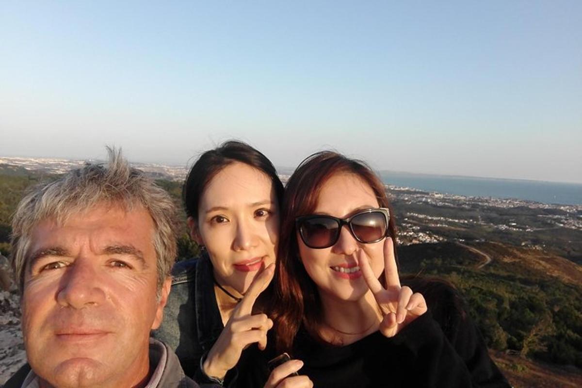 a man and two women posing for a picture