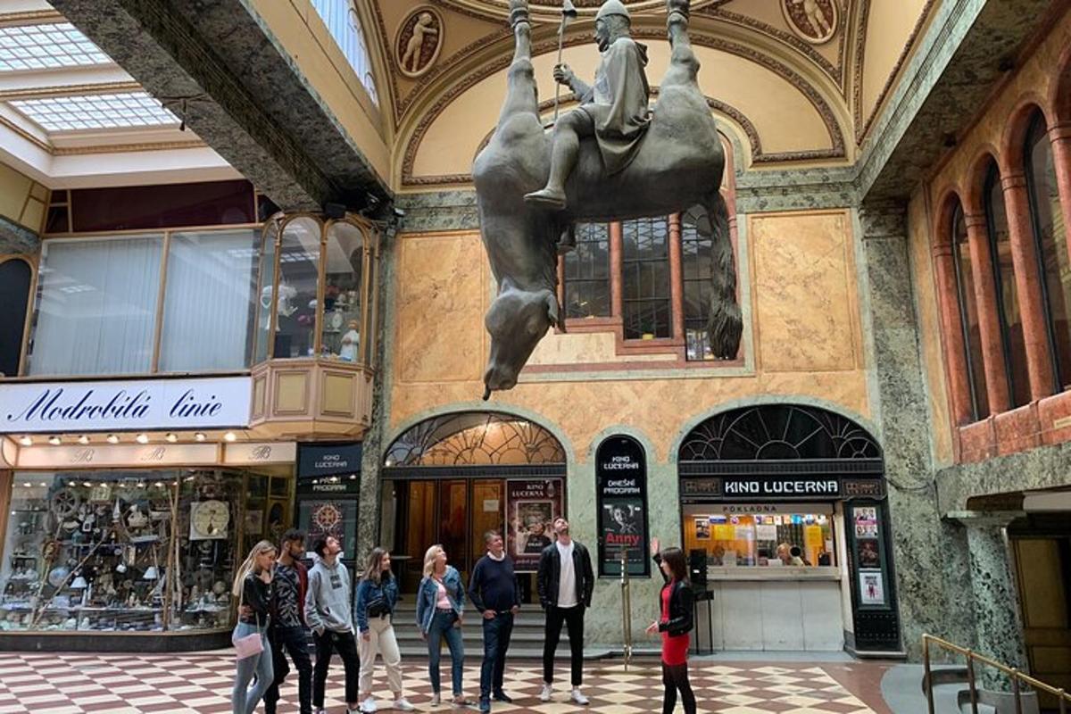 a statue of a woman riding a horse in a shopping mall