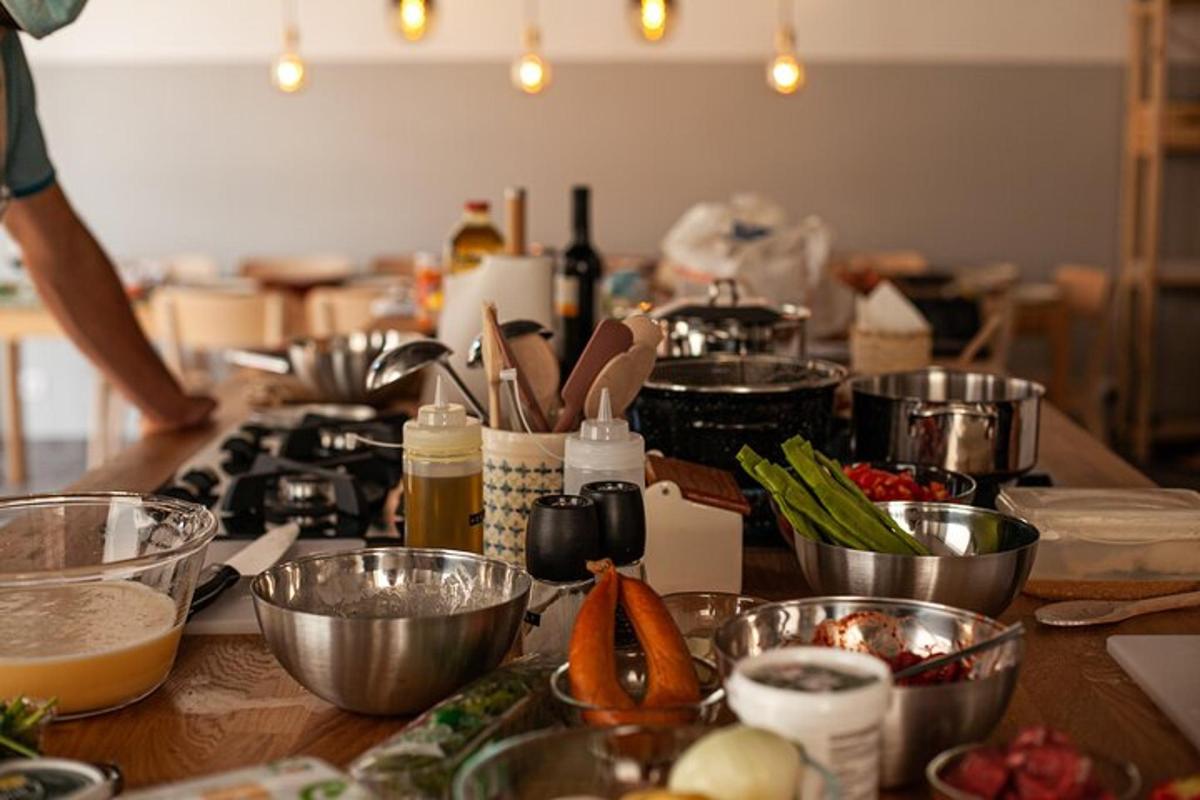 a kitchen counter with lots of food ingrediants
