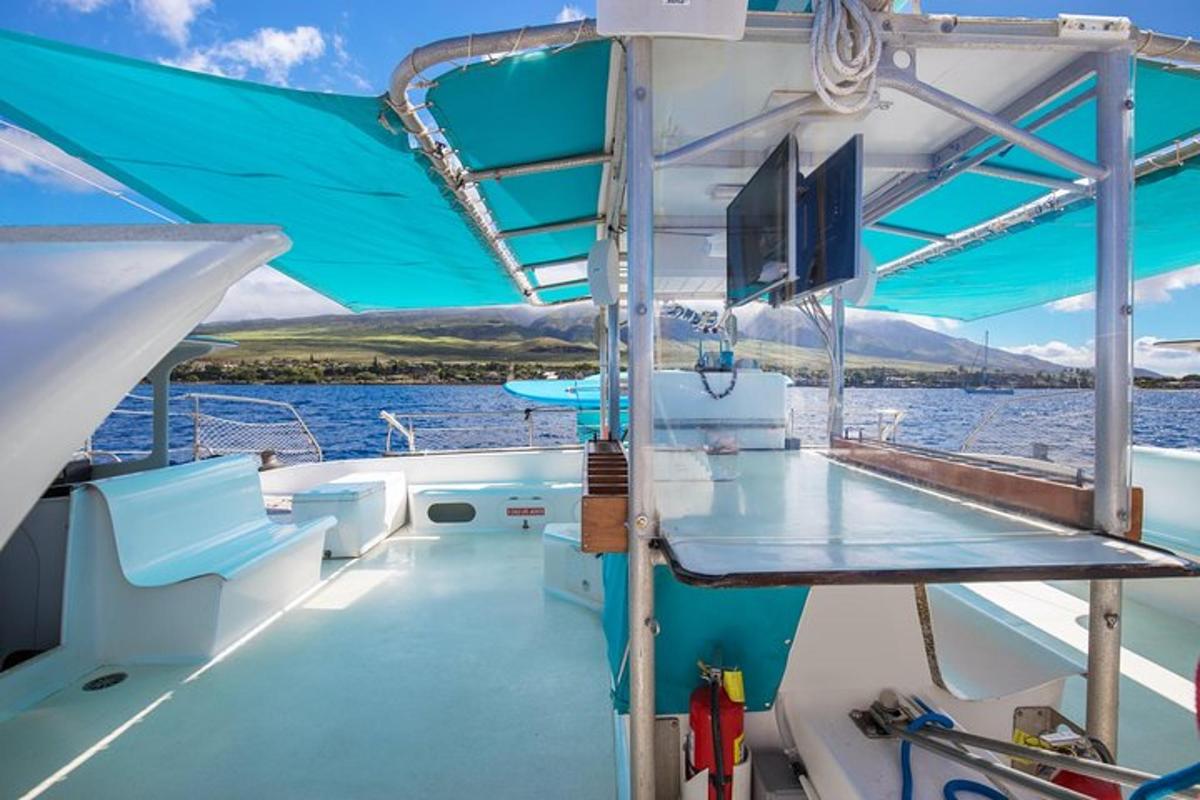 a view from the back of a boat in the water