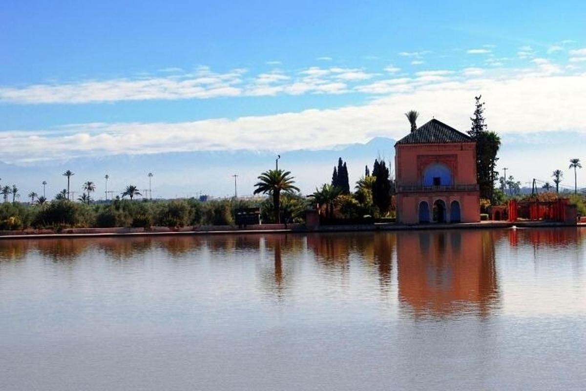 a building sitting in the middle of a lake
