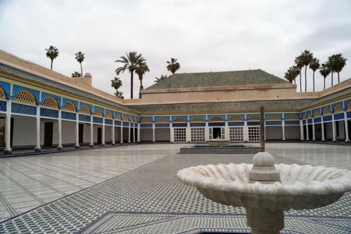a building with a fountain in the middle of a courtyard
