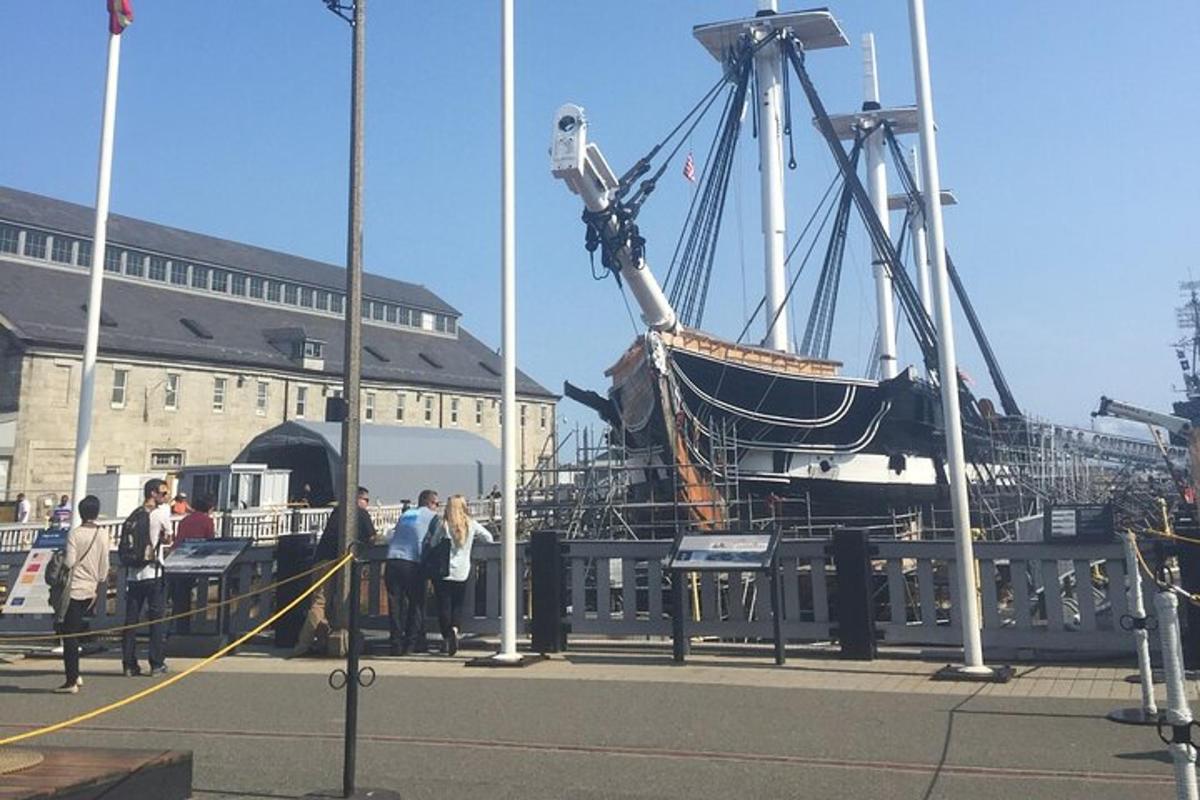 a boat is docked next to a building