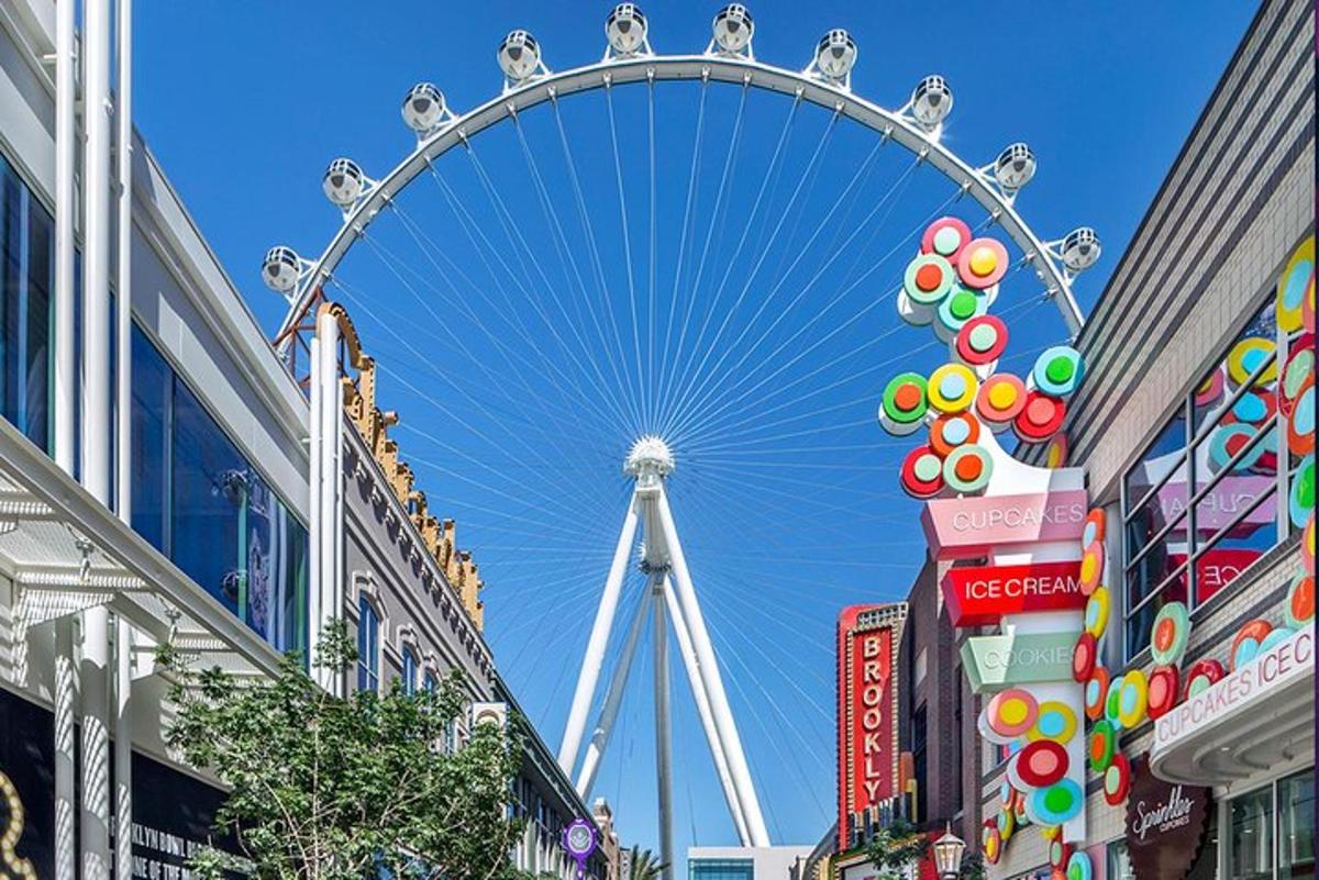a large ferris wheel in the middle of a city