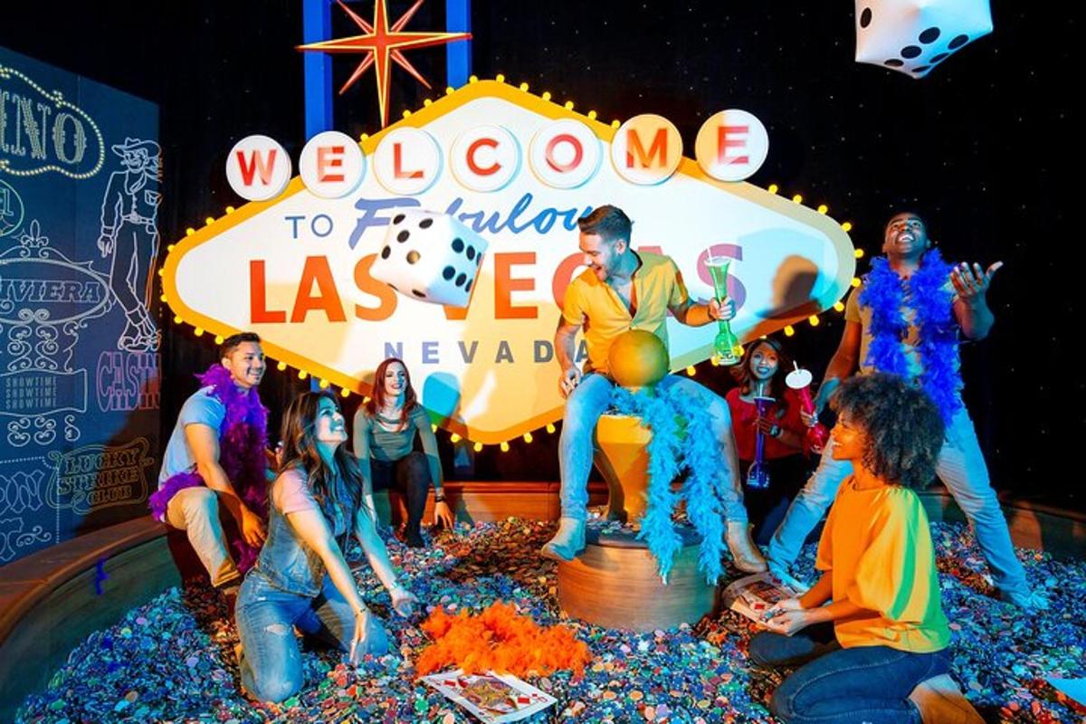 a group of people sitting in front of a sign