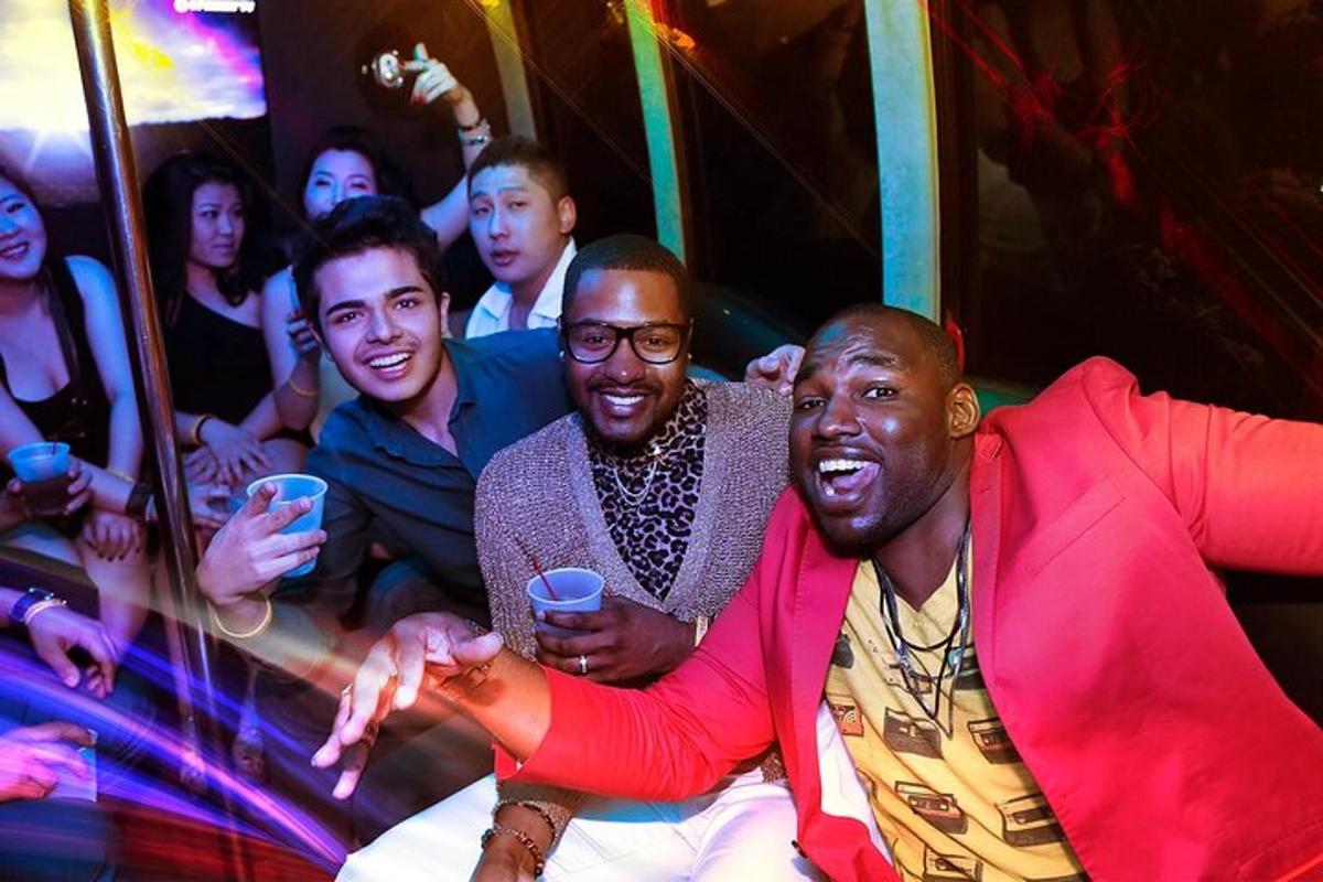 a group of men posing for a picture at a party