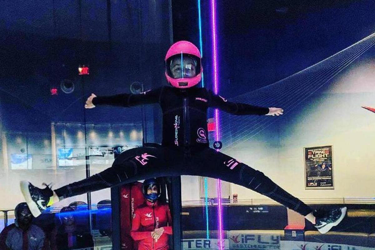 a person in a pink helmet and a person in