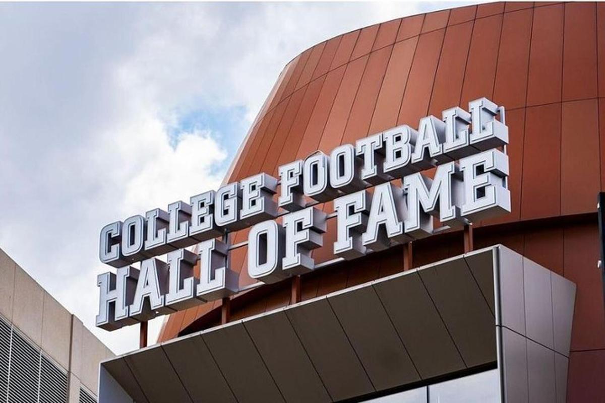 a building with a sign that reads college football hall of fame