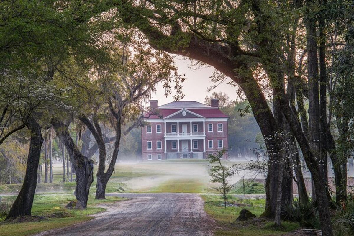 a painting of a house in the middle of a dirt road