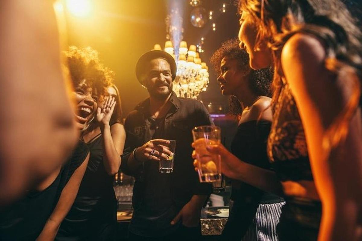 a group of people drinking at a party