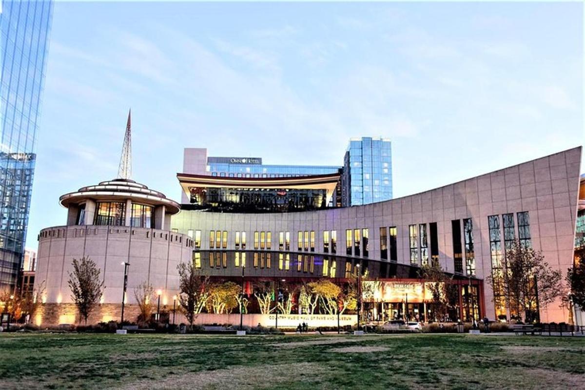 a large building in a city with tall buildings