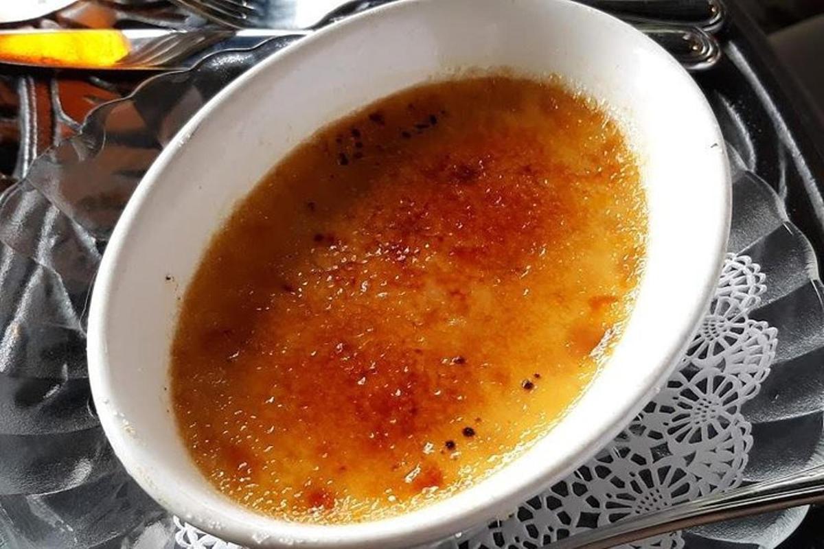 a bowl of soup sitting on a table