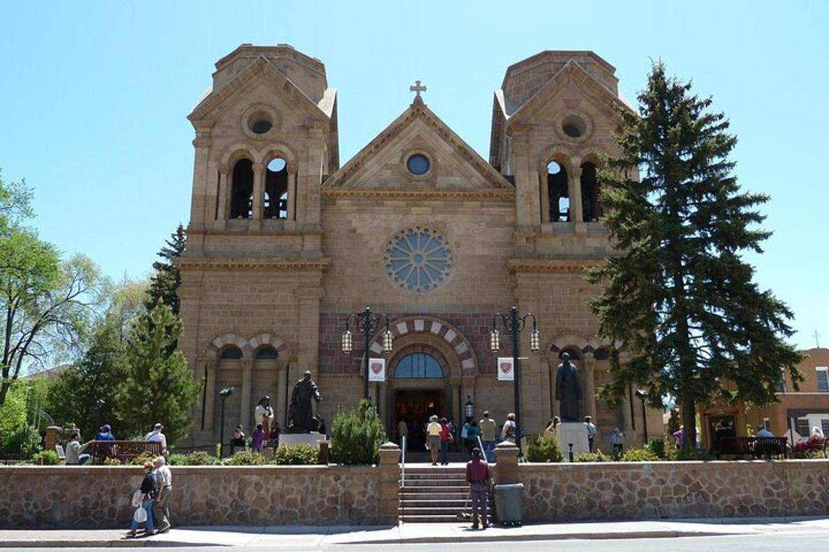 a church with people standing in front of it