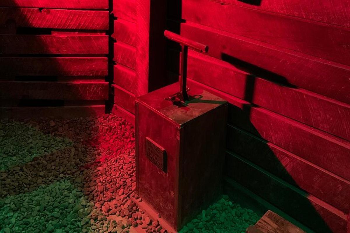 a red room with a red wall and stairs