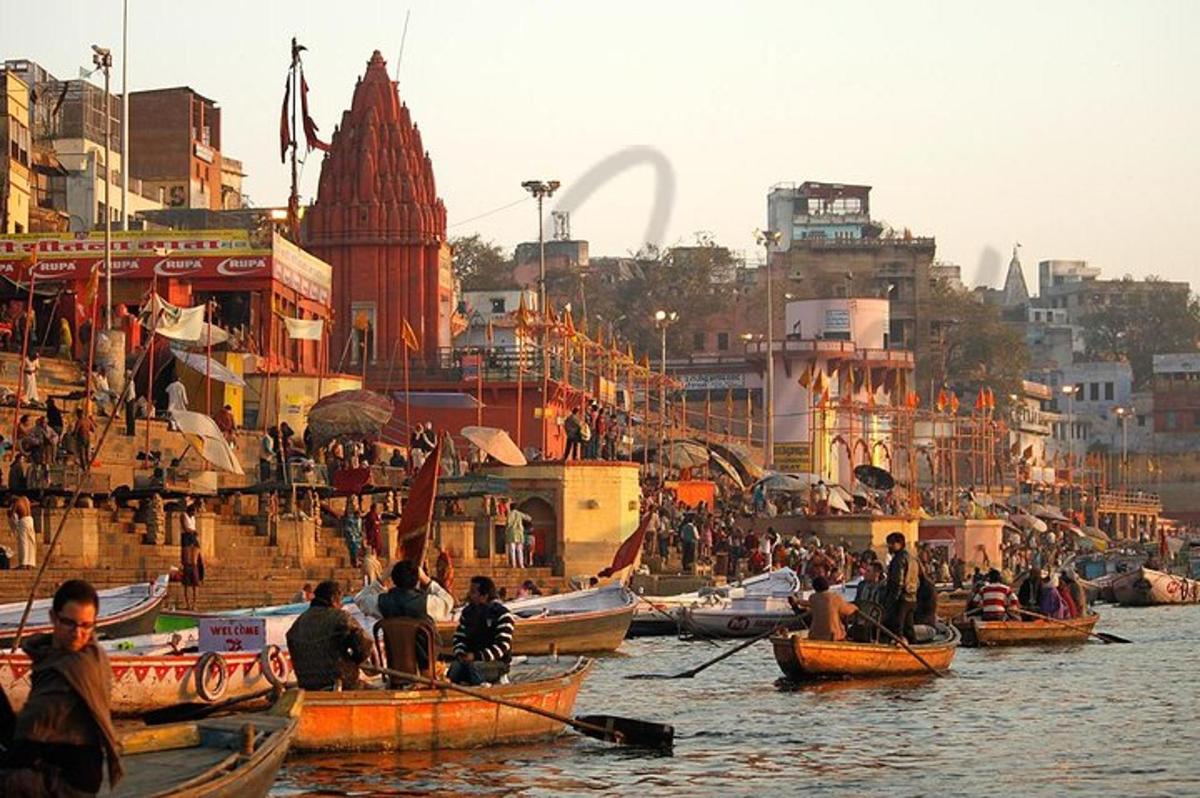 a group of people on boats in a river