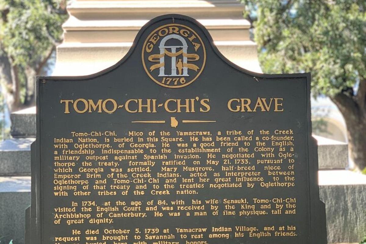 a sign for a tombo chi chi charities grave