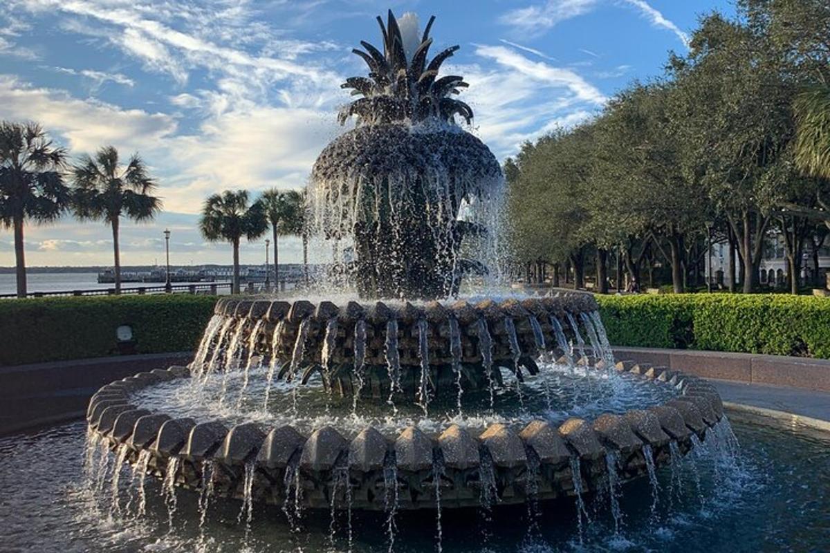 a fountain with a pineapple on top of it