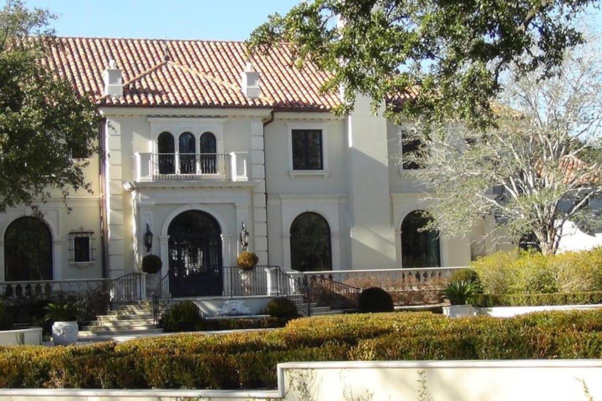a large white house with a red roof