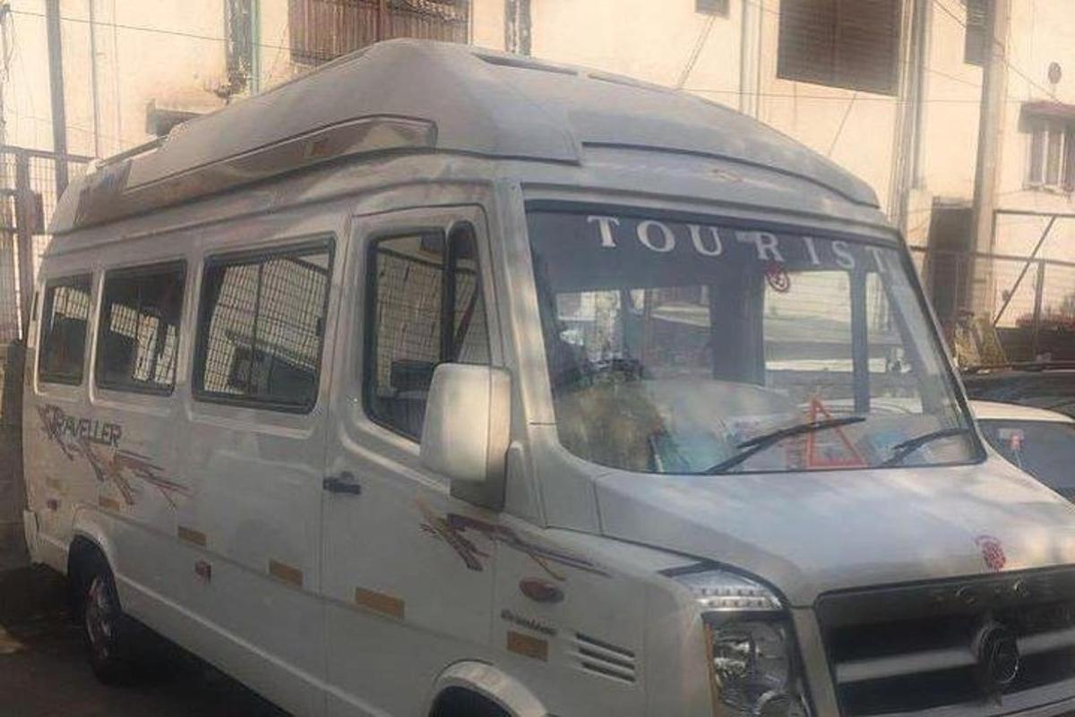 a white van with the word tour written on the front