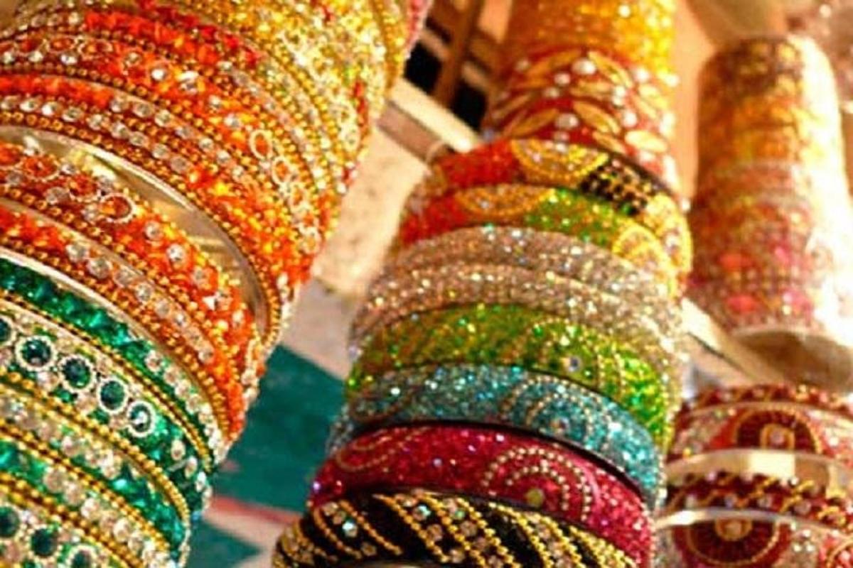 a row of bangles on display in a store