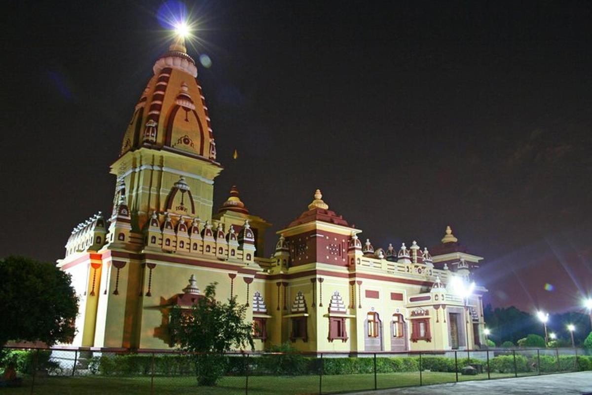 a large building with a tower at night