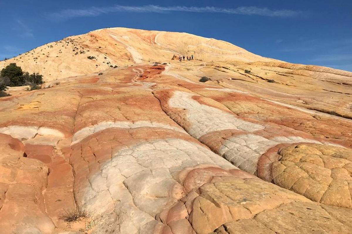 a view of a mountain with red rocks