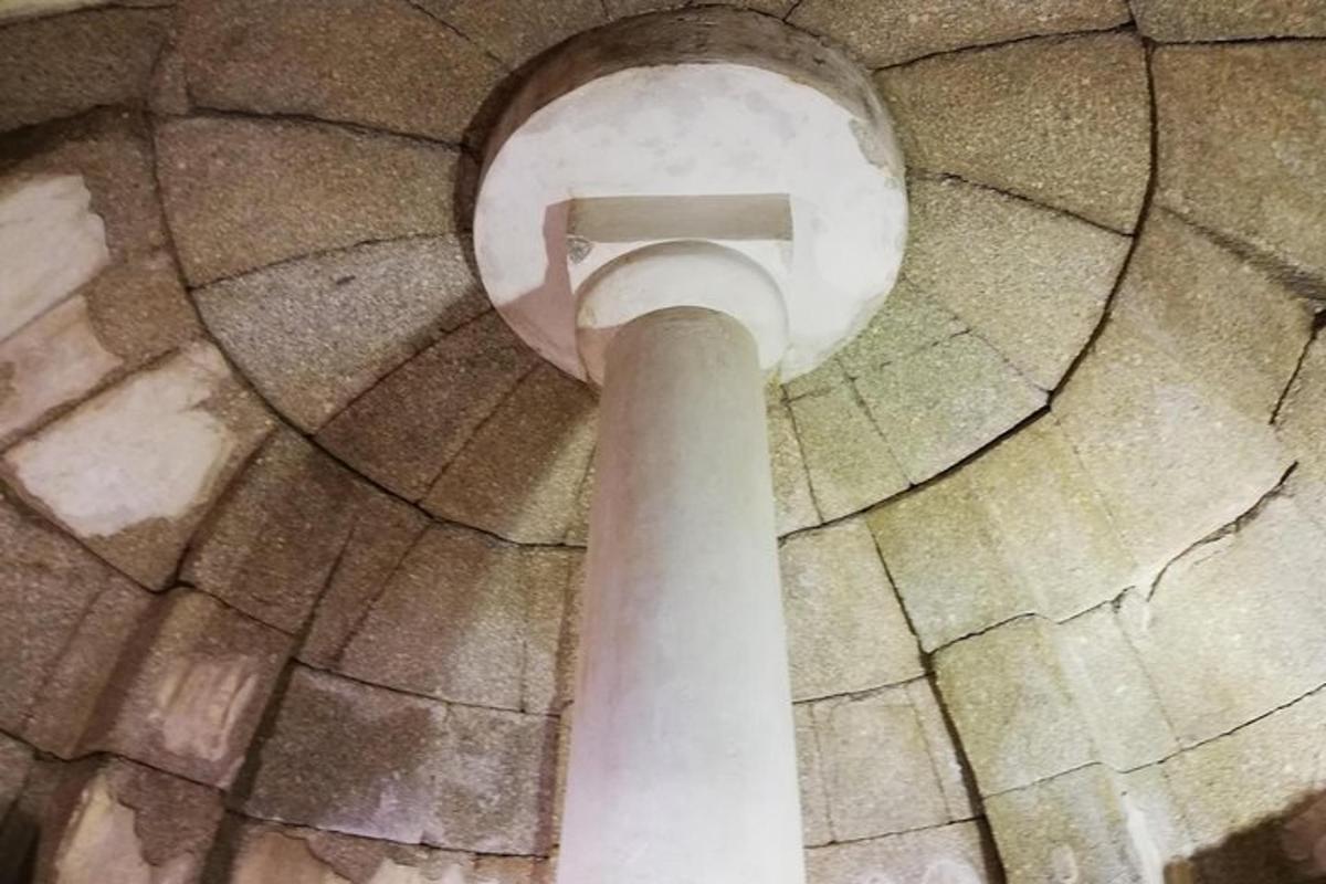 an overhead view of a toilet in a building