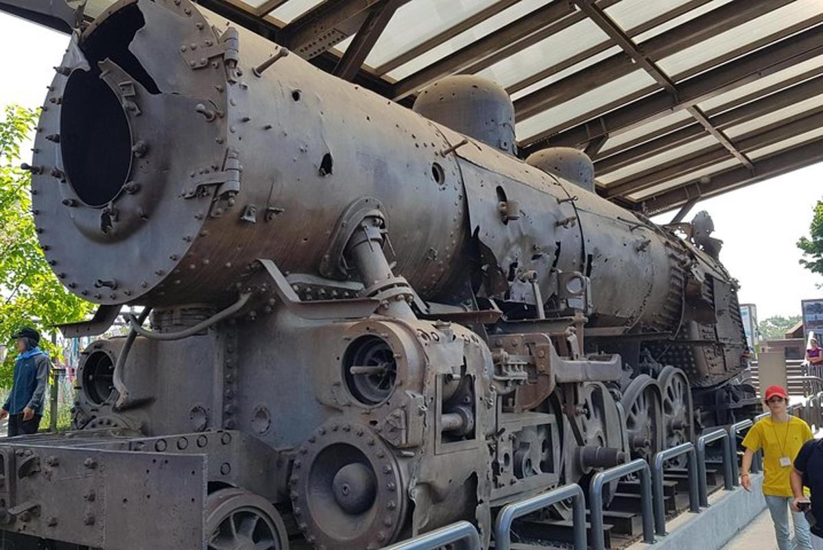 an old train on display at a train station