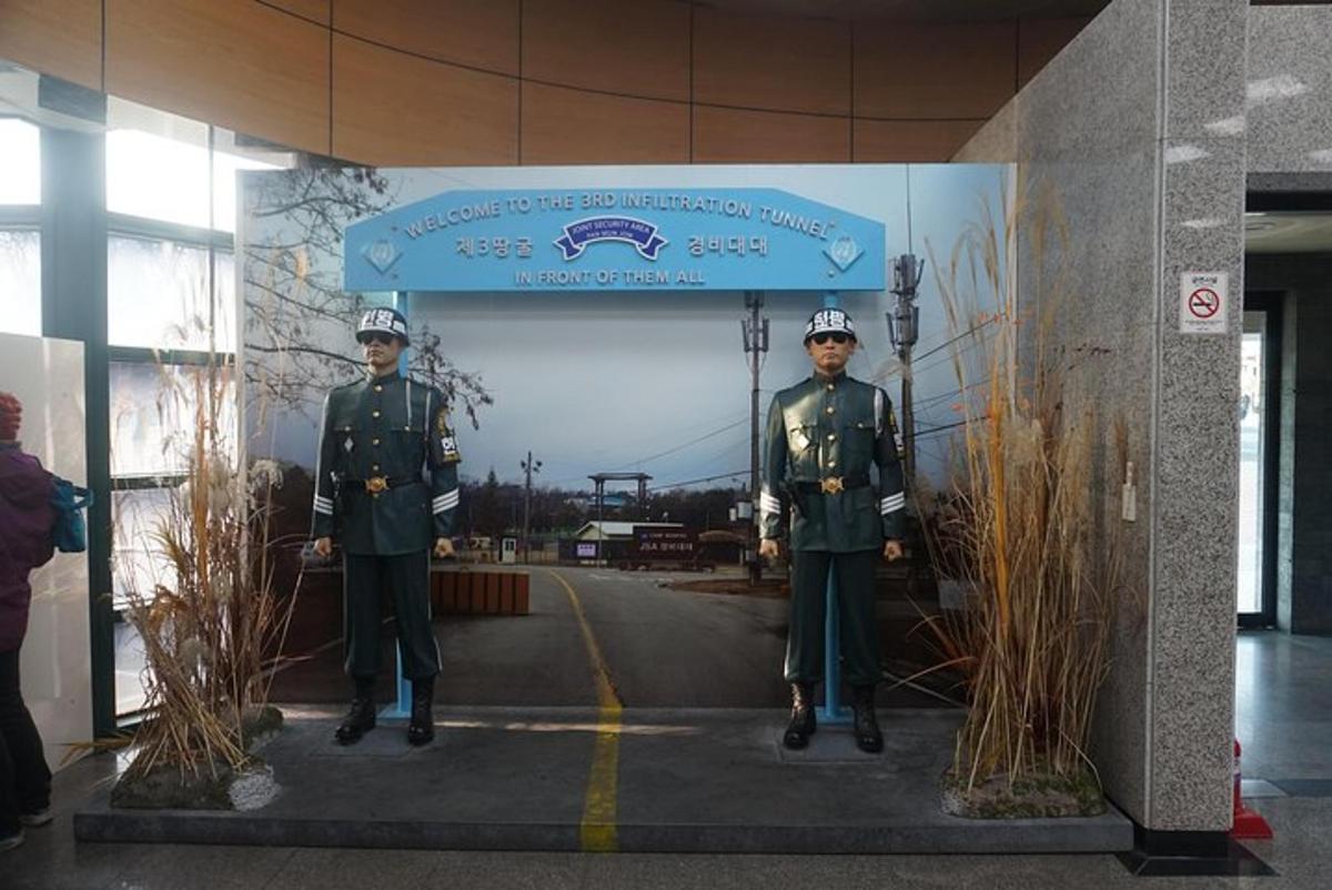 a display of two military men in uniform in a building