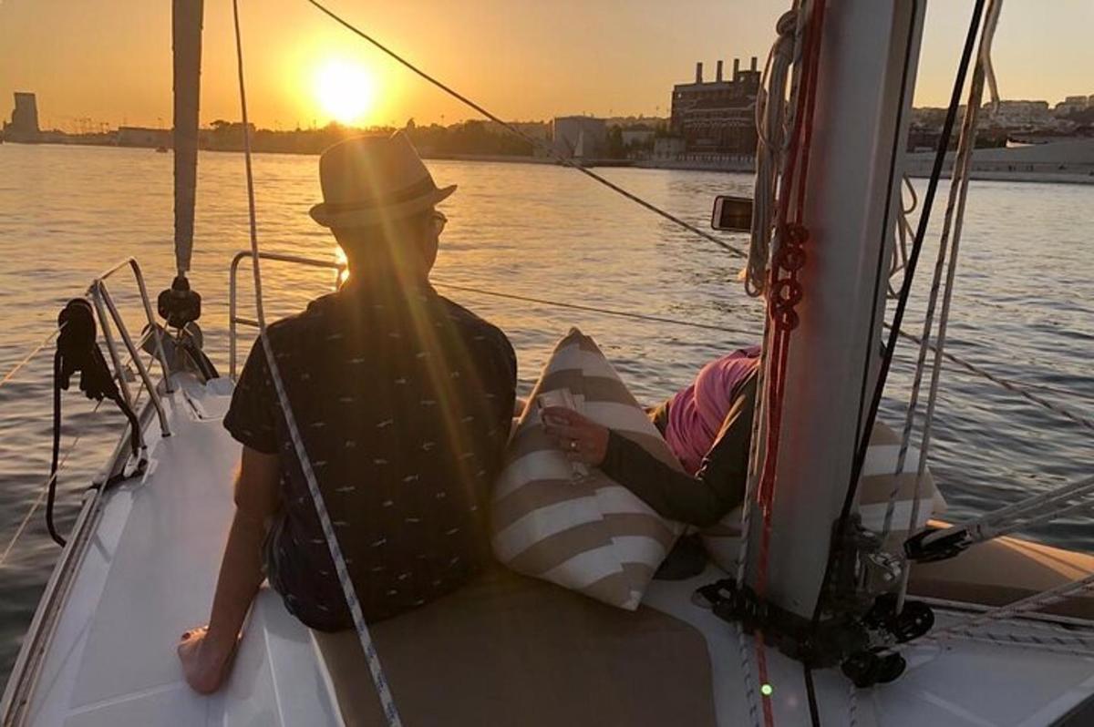 a man and a child sitting on a boat in the water