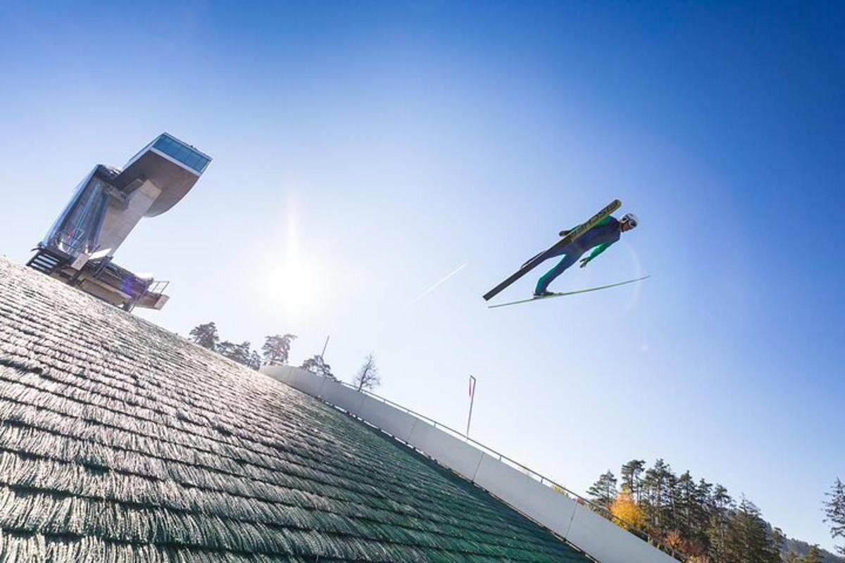 a man flying through the air while riding skis