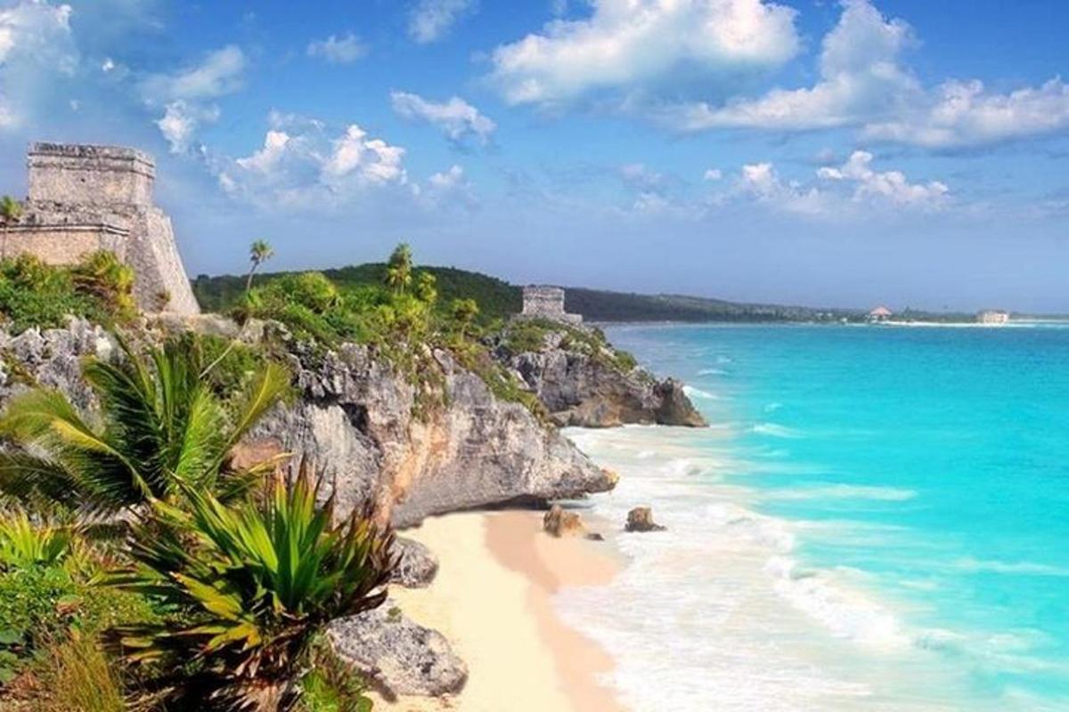 a beach with a castle and the ocean